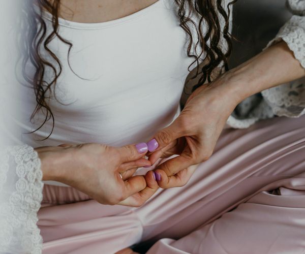 Close-up of a person meditating with focus on calm breathing.